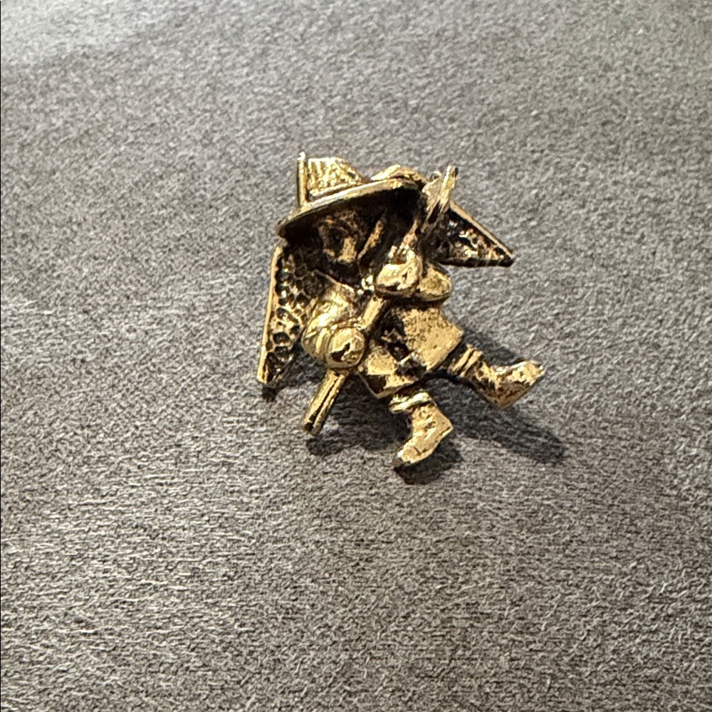 Charming Gold tone Fireman Brooch.